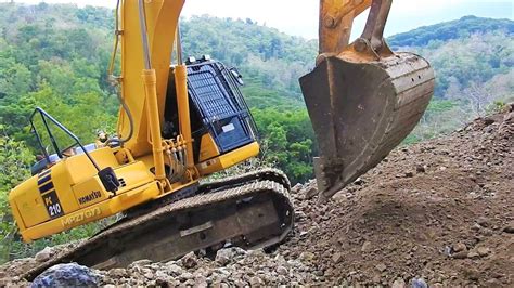 how to use excavators on slopes